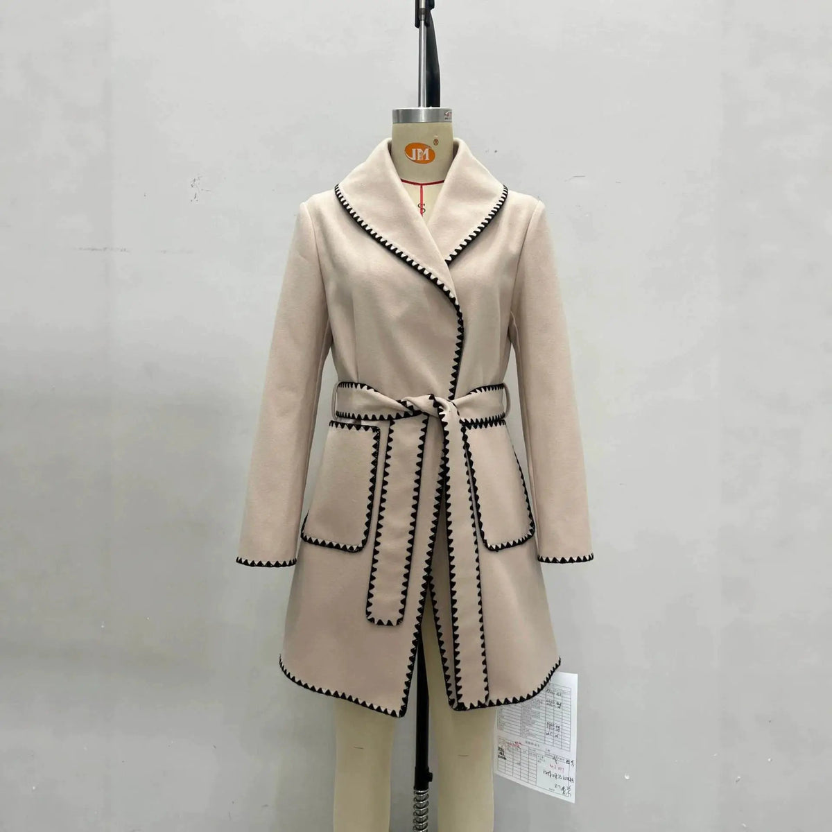 Wool Pardessus coat with notched lapel in beige, black zigzag trim and waist belt by eprolo