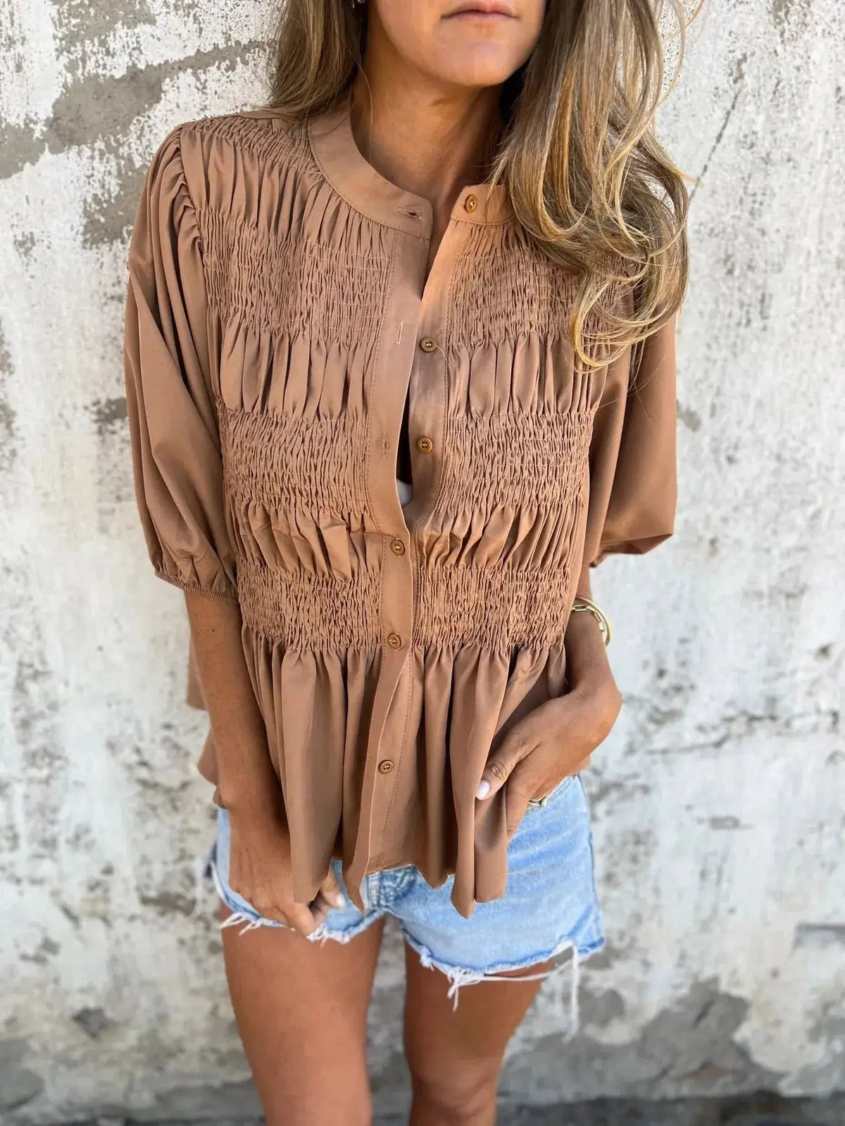 Plus-size brown smocked puff-sleeve blouse with button-down front