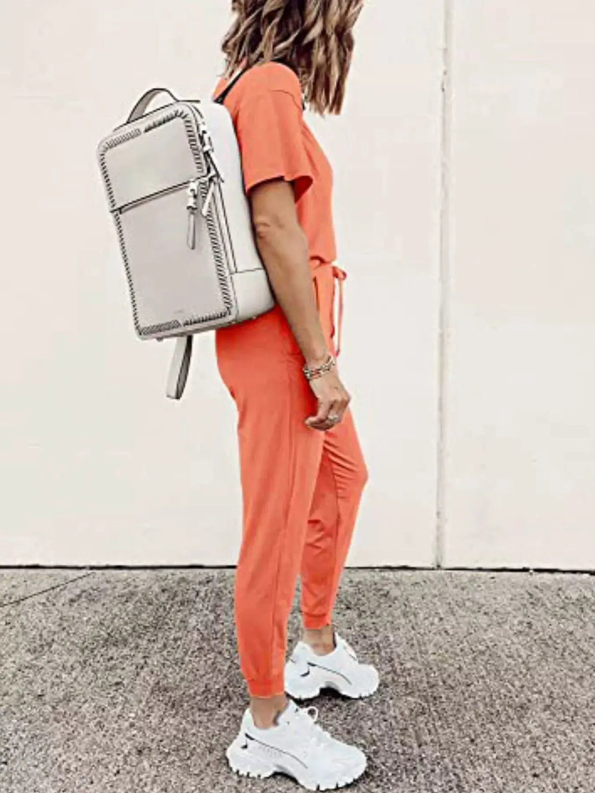 Trendsi full-size two-piece set: coral round-neck top with drawstring pants, plus size