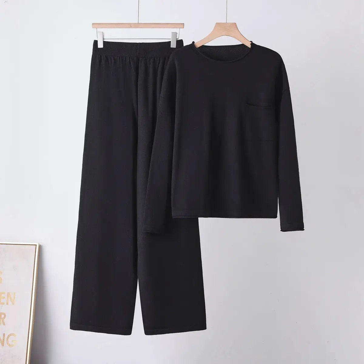 Women's black two-piece sweater and wide-leg pants set with pockets by eprolo
