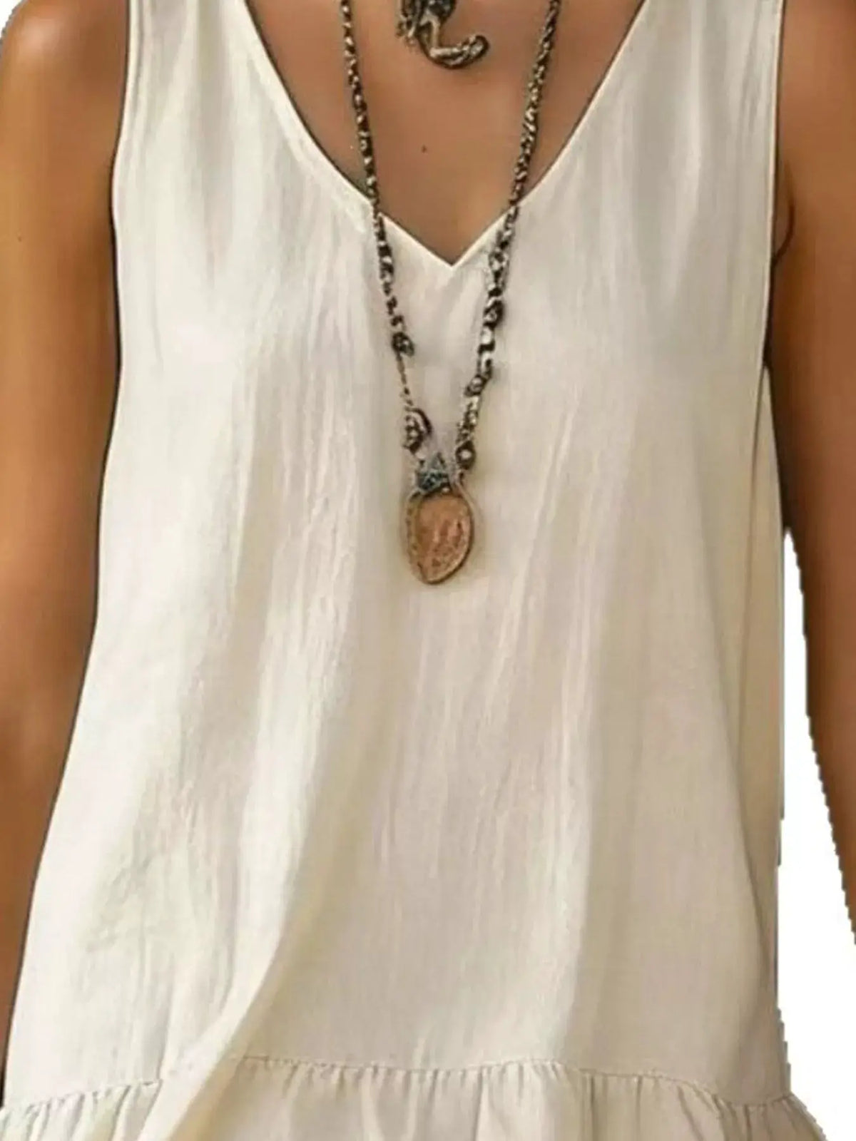 Full-size white sleeveless dress with a V-neck and ruffled hem