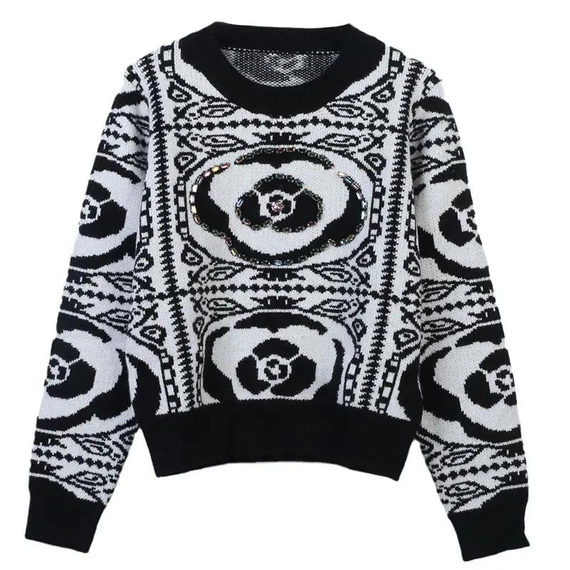 Women’s soft knit pullover sweater in black-and-white floral pattern, relaxed fit