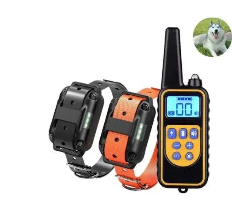 Remote dog training collar set by AdTec, with two collars in black and orange and a handheld transmitter.