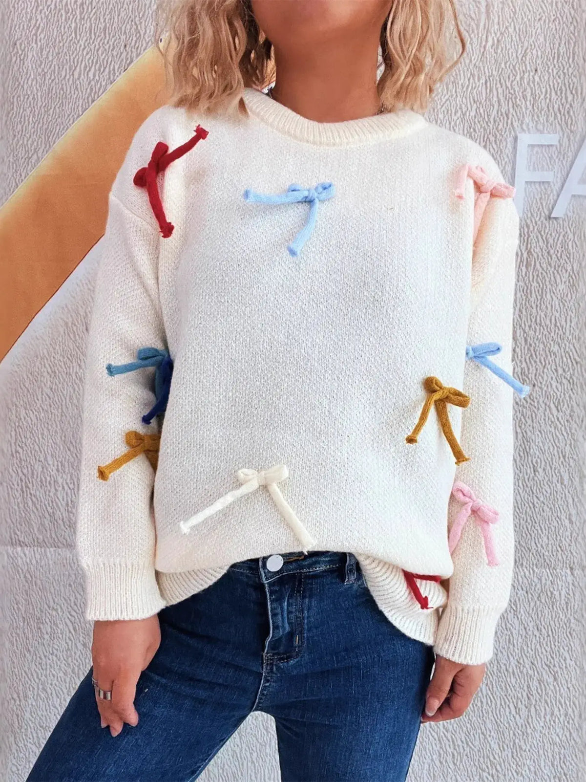 Vibrant Bow Accent Round-Neck Sweater for Women, white knit with multicolor bows.