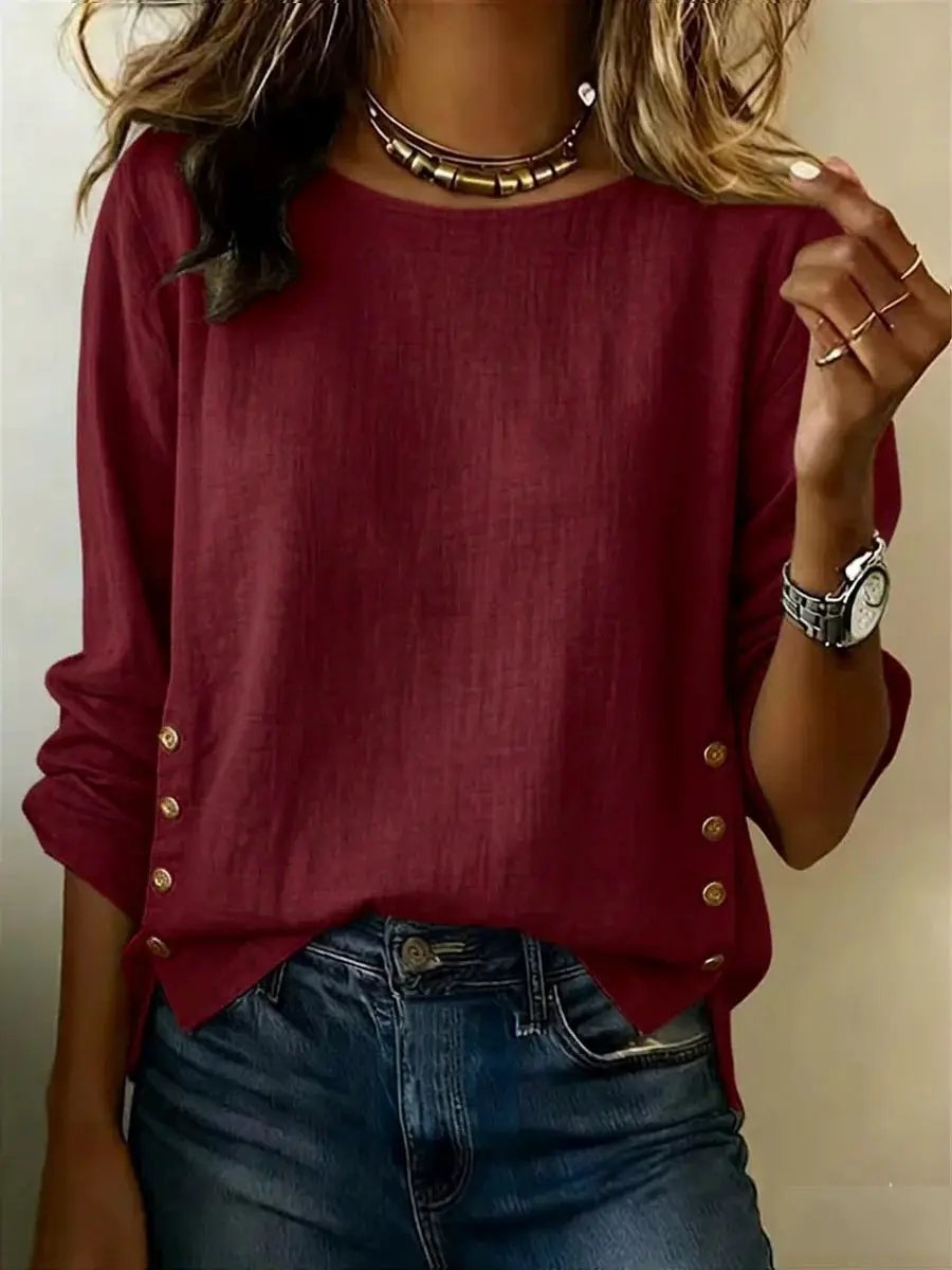 Breathable linen short-sleeve crew-neck T-shirt in burgundy with gold side button accents.