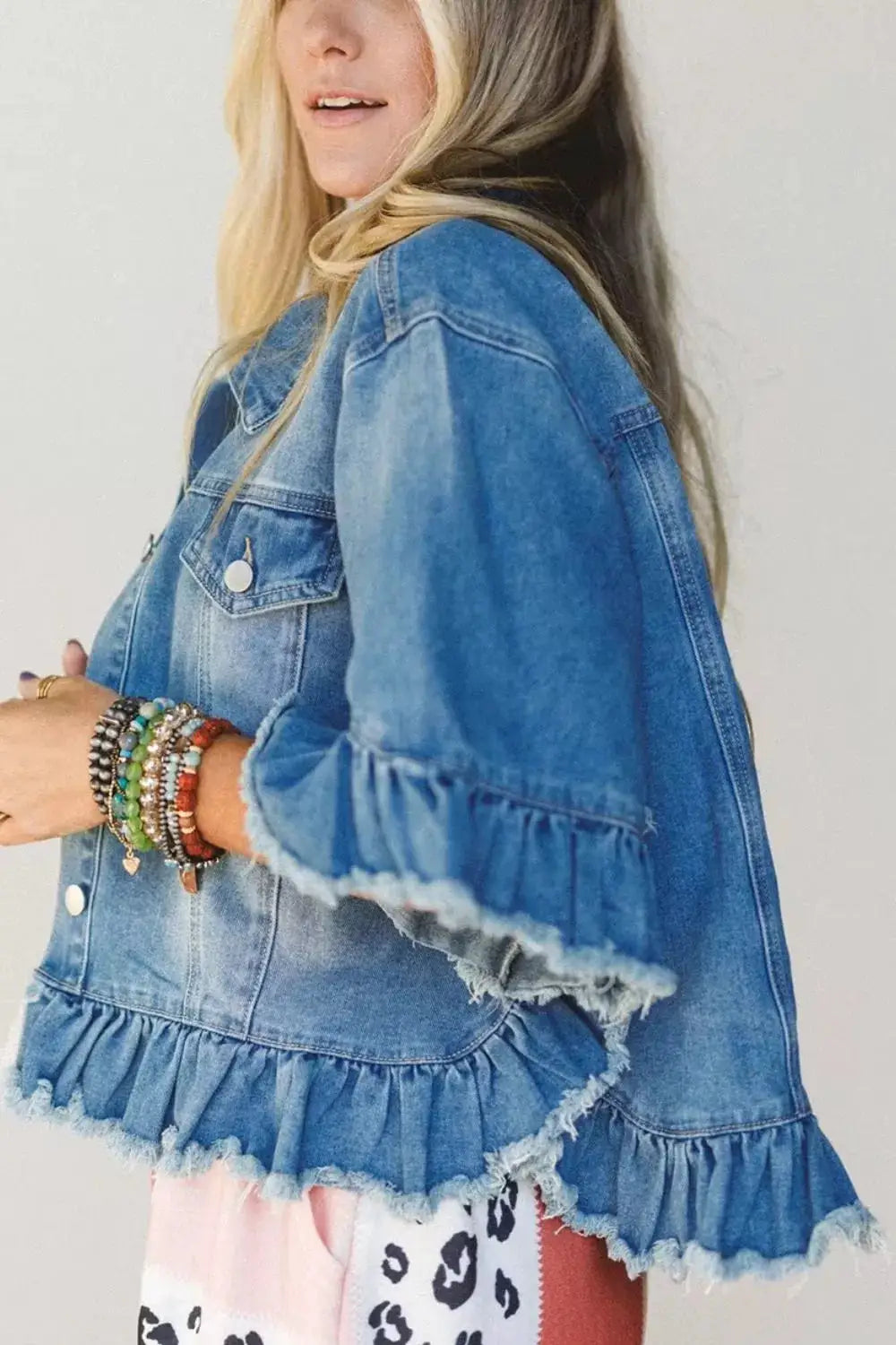 Womens light-wash denim jacket with ruffle hem, raw-edge detailing, and half sleeves, Trendsi western style