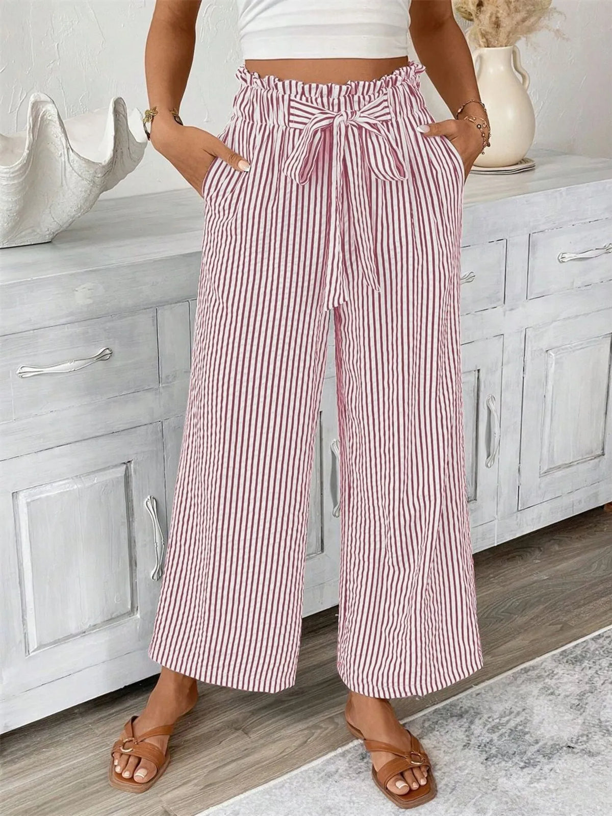 Full Size Striped Wide-Leg Paper Bag Palazzo Pants by Trendsi with pockets and a tied waist, red and white stripes