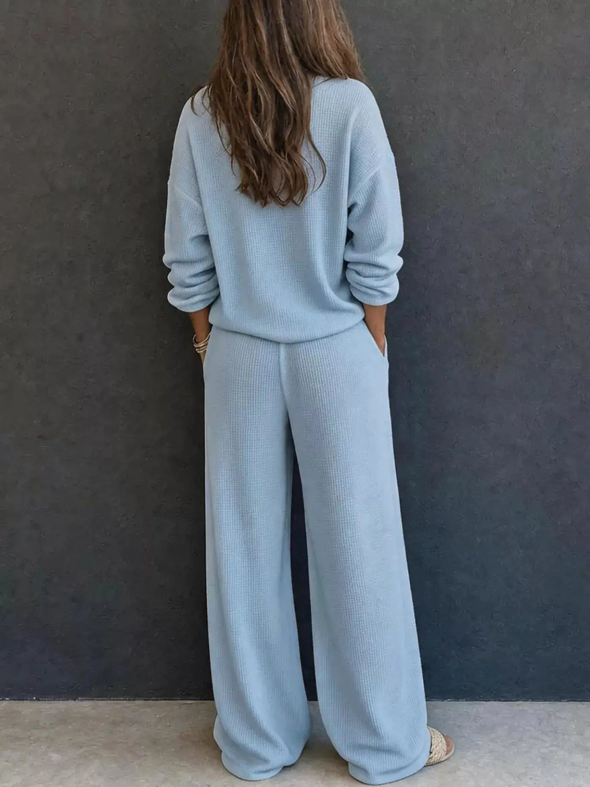 Waffle-knit Henley top and wide-leg pants two-piece set in light blue, back view.