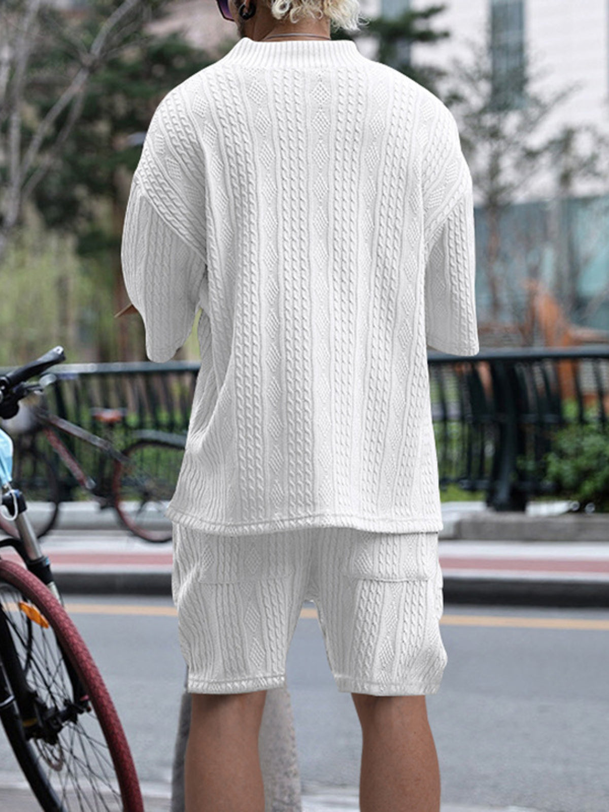 Men's plus-size white knit V-neck short-sleeve top and shorts set with cable-knit texture.