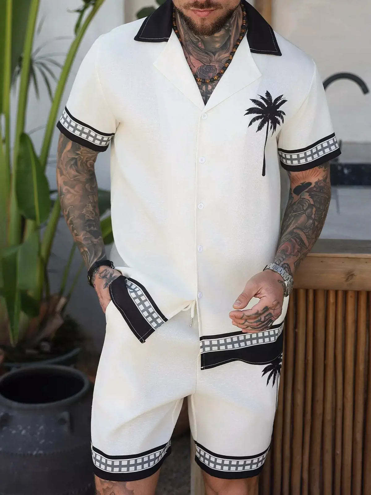 Men's tropical palm tree print short sleeve shirt and matching cream shorts set with black trim