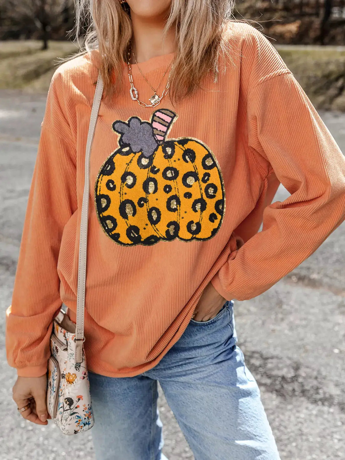Sweatshirt in orange ribbed fabric with a leopard-print pumpkin graphic, Halloween-themed, Trendsi