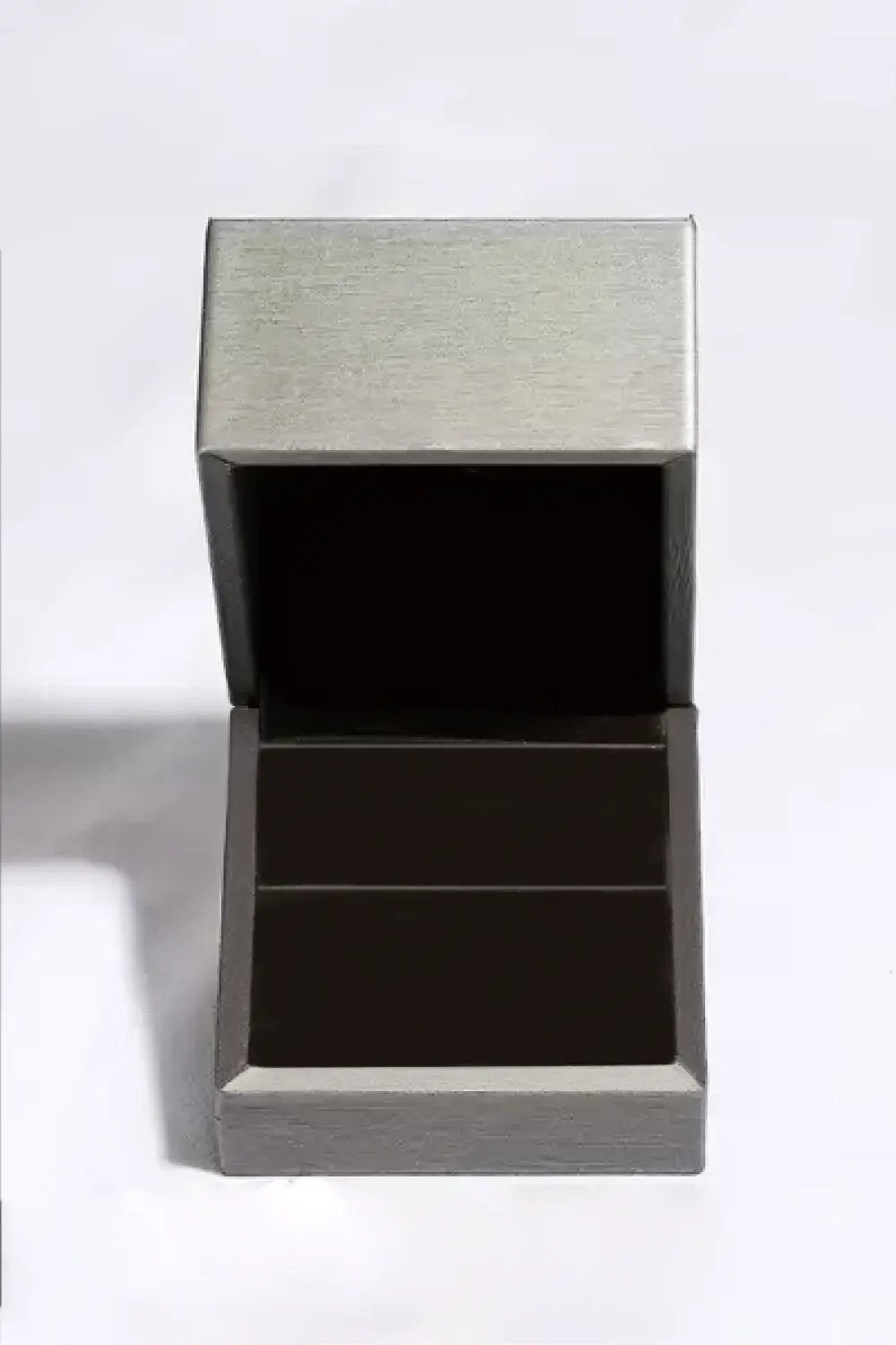 1 Carat Moissanite Rhodium-Plated Halo Ring in a silver and black jewelry ring box