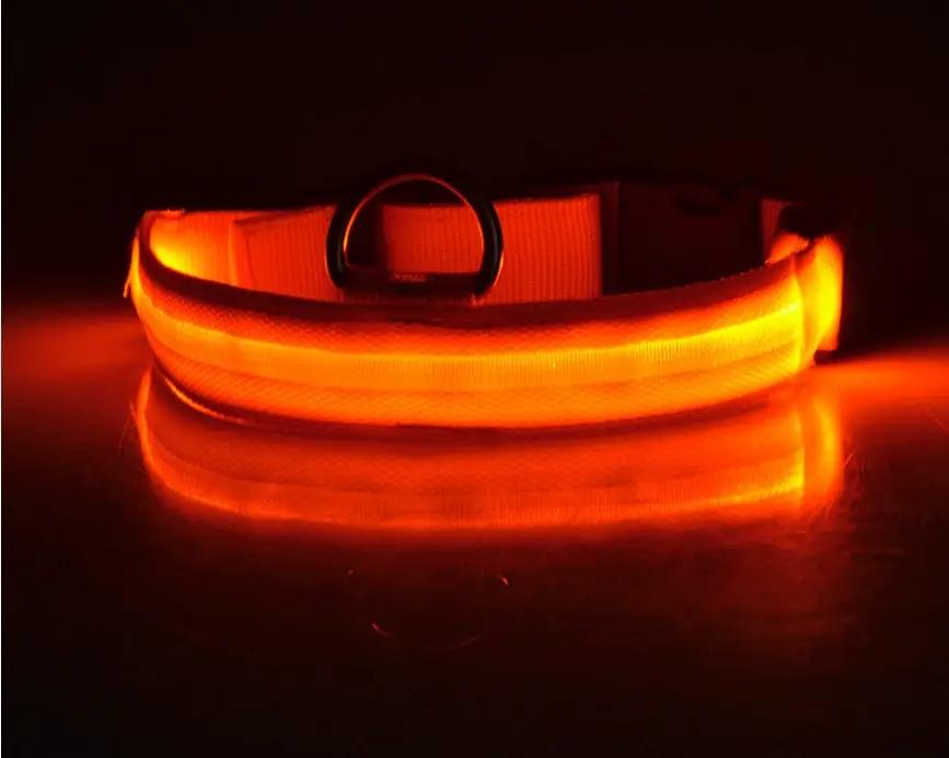 Nylon LED pet collar with bright orange glow, adjustable night-safety collar for dogs and cats.