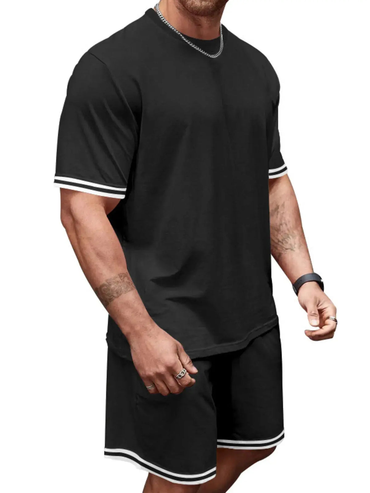 Men's two-piece summer set: black short-sleeve tee with white-trim cuffs and hem, matching black shorts by Trendsi.