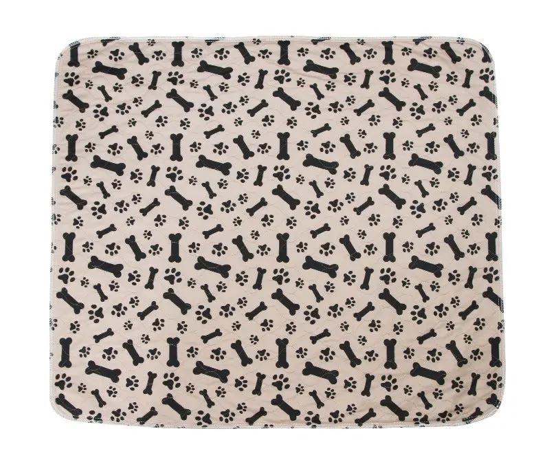 Three-layer waterproof pet absorbent pad beige with black bone and paw print pattern by AdTec
