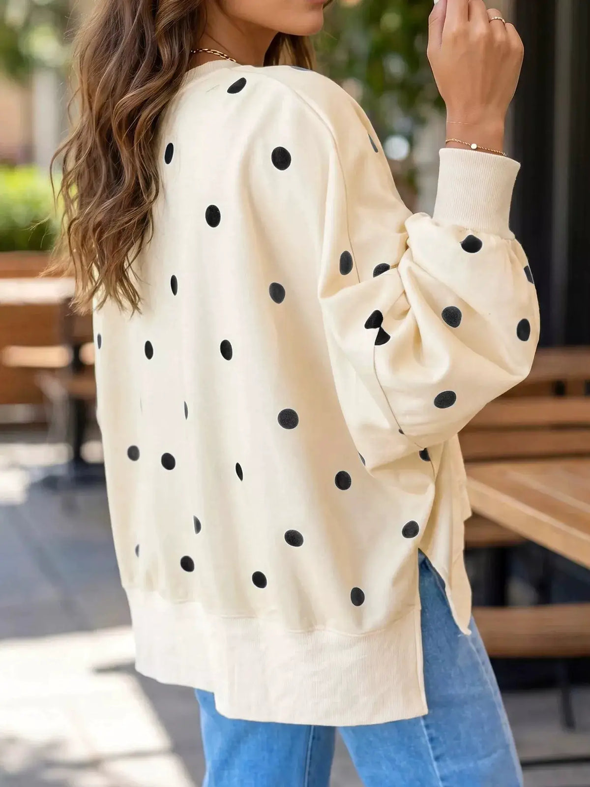 Side Slit Polka Dot Oversized Sweatshirt in cream with black polka dots and ribbed cuffs, relaxed fit
