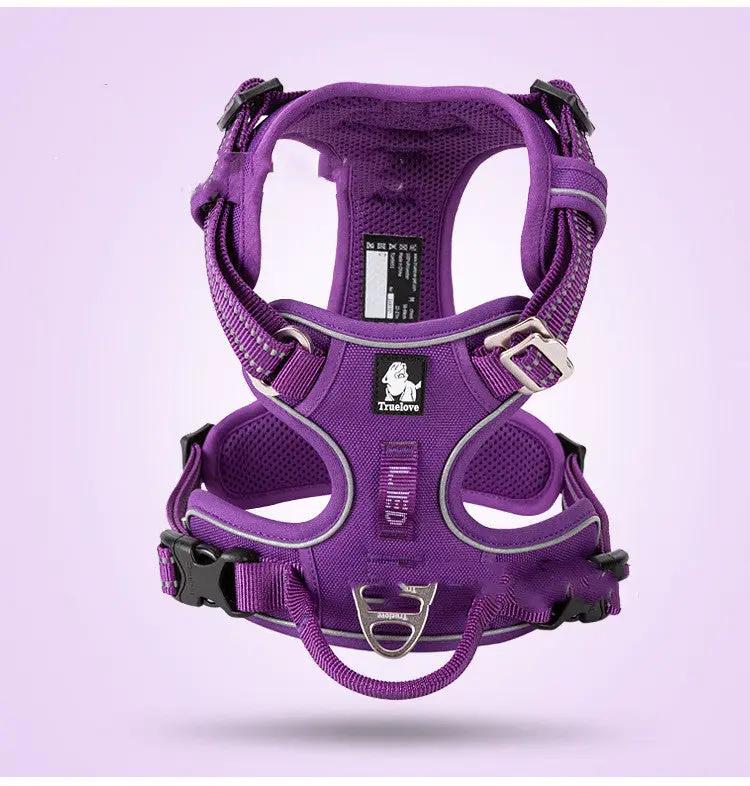 Purple vest-style dog harness with adjustable straps and metal D-ring