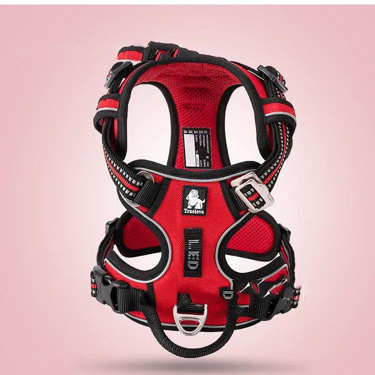 Red vest-style dog harness with black trim, metal D-ring, buckles, and TrueLove logo.