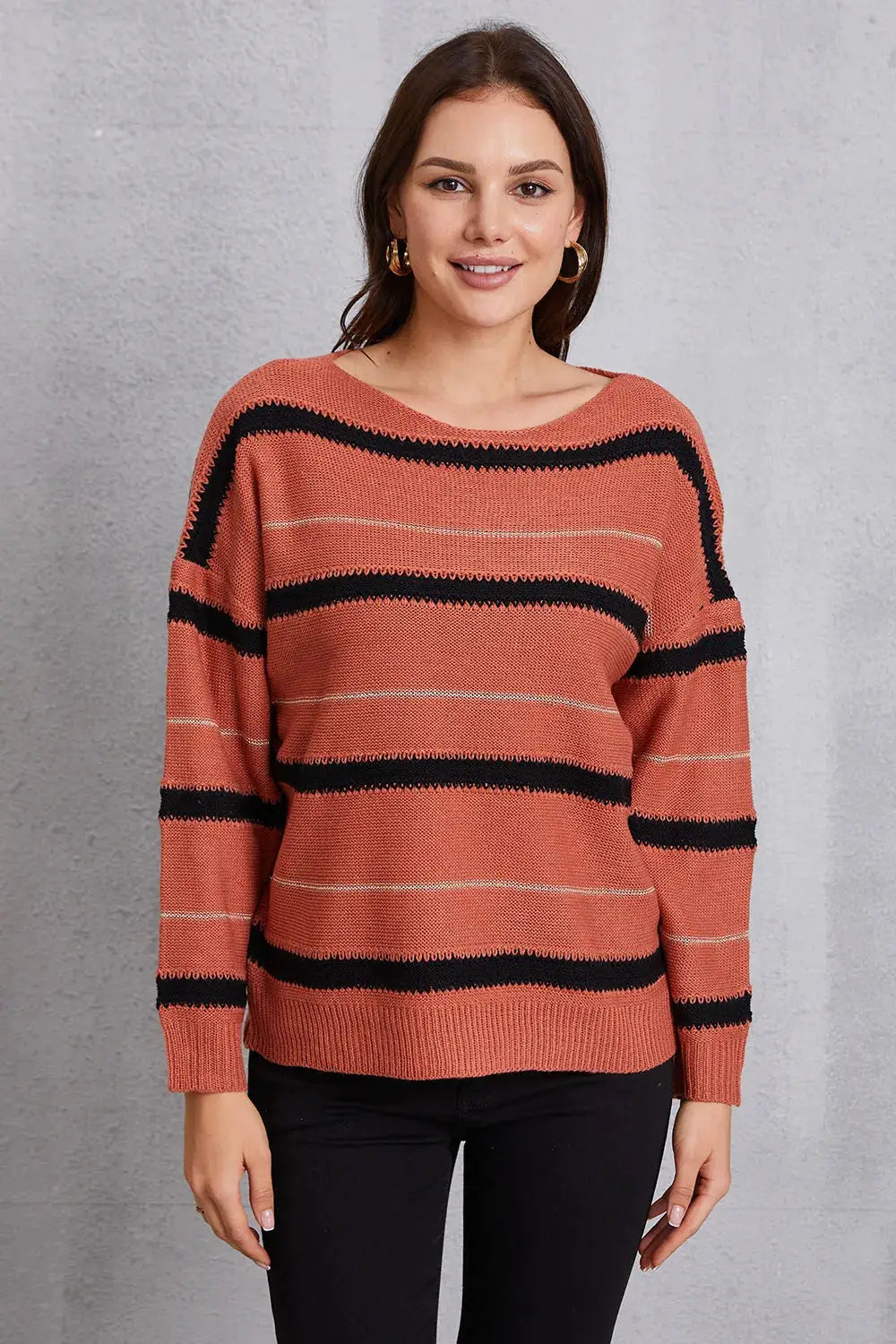Relaxed round-neck striped knit sweater by Trendsi in coral with black stripes