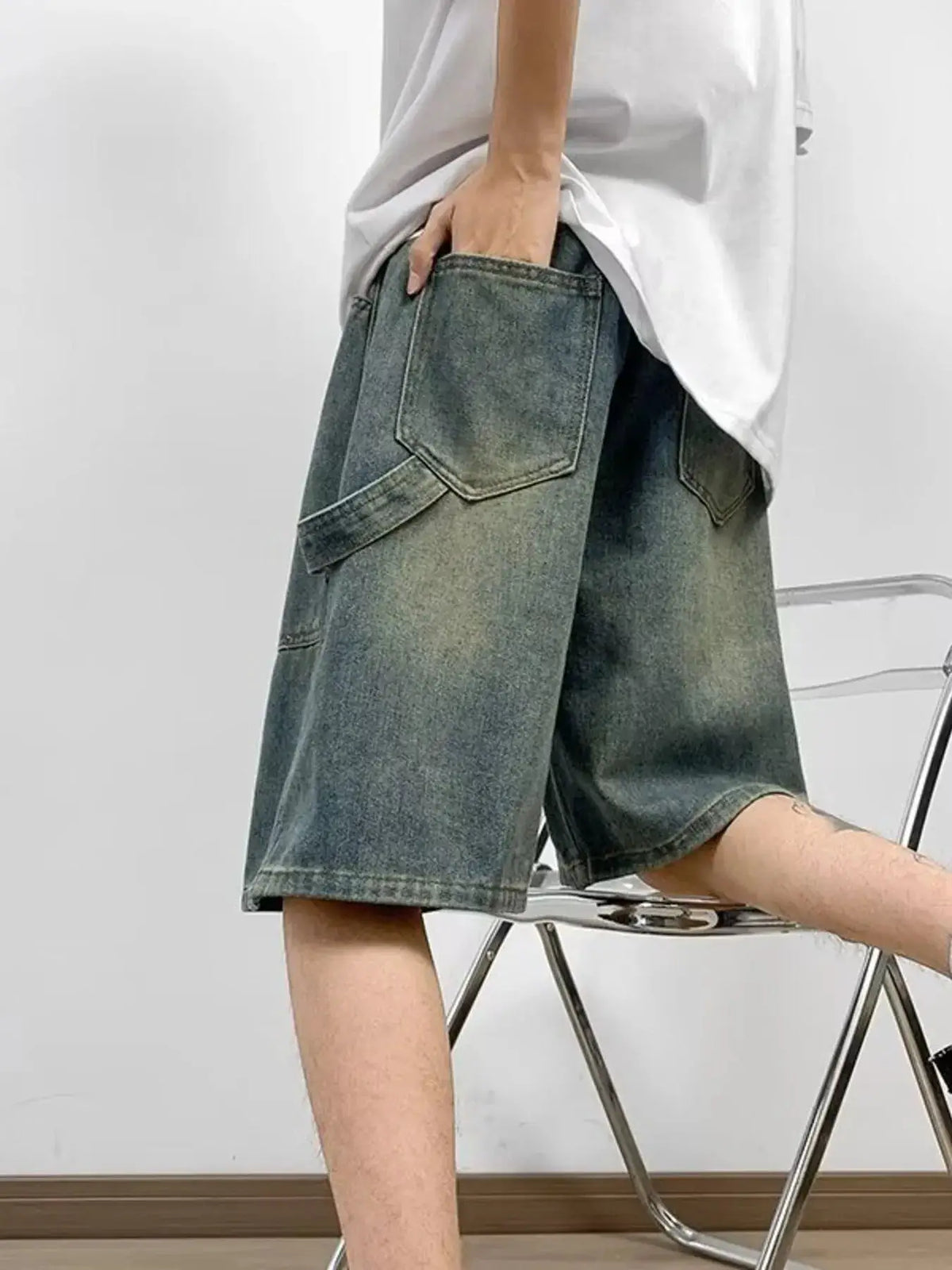 Men's plus-size loose-fit washed denim shorts with stretch fabric, blue denim, back pockets
