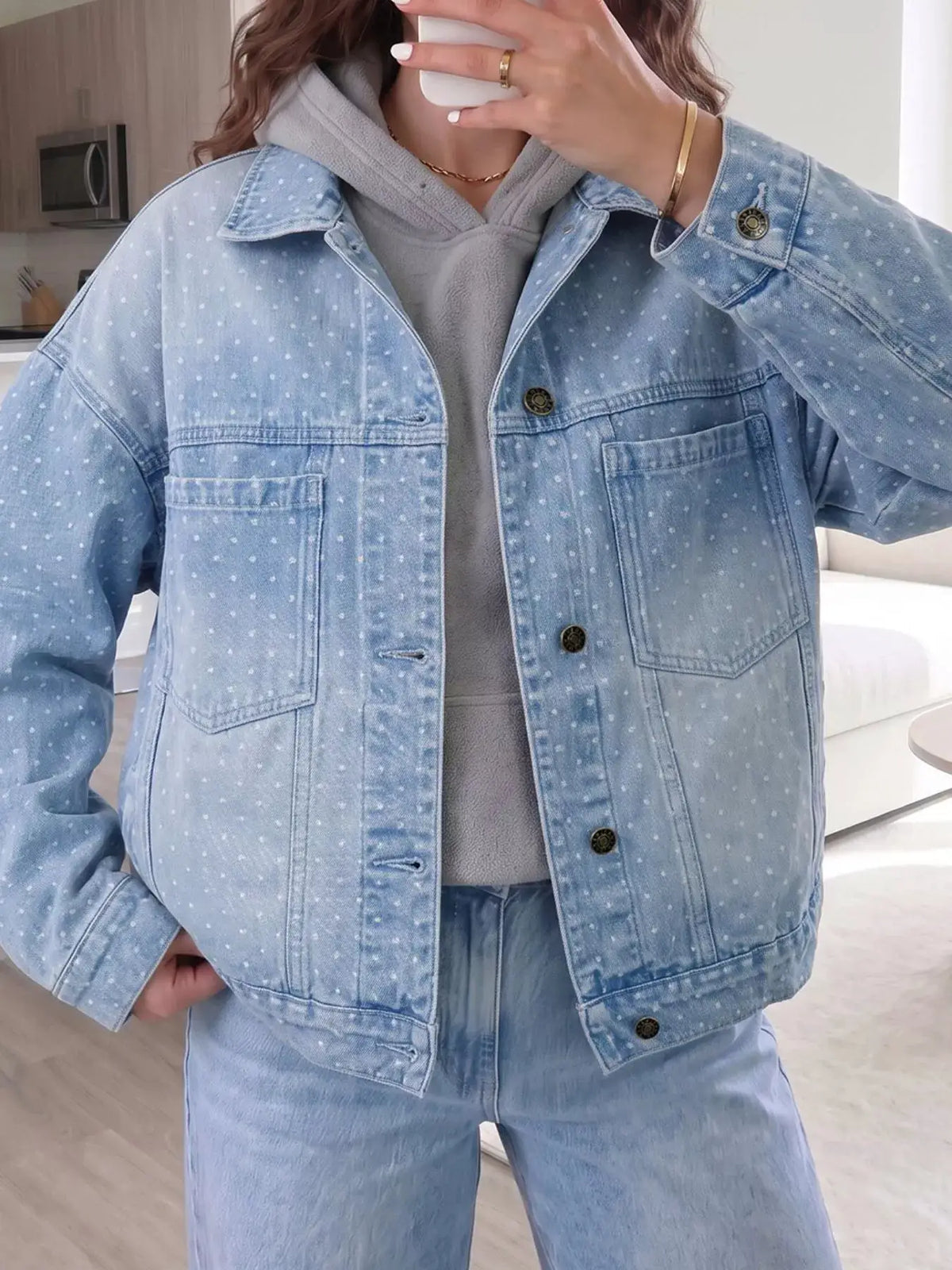 Polka dot long-sleeve denim jacket with pockets in light wash by Trendsi
