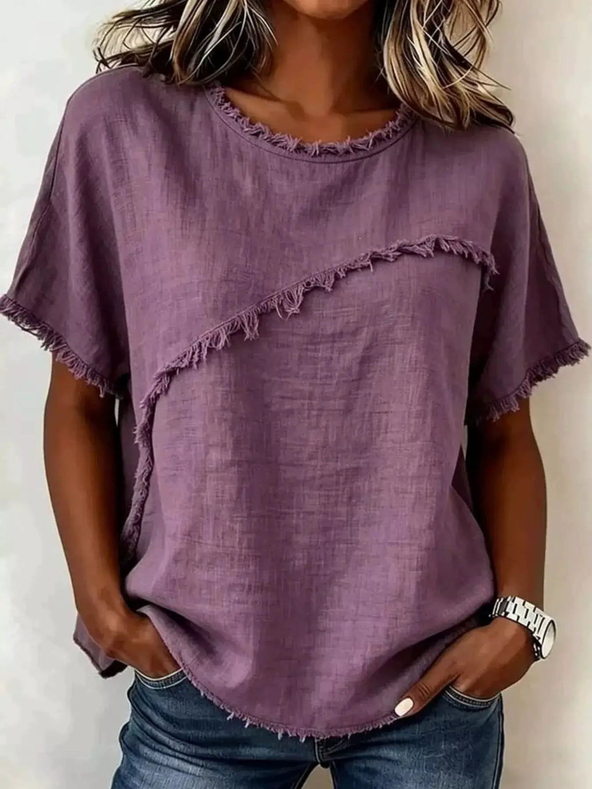 Plus-size purple frayed-hem short-sleeve top with frayed neckline and diagonal fringe across chest