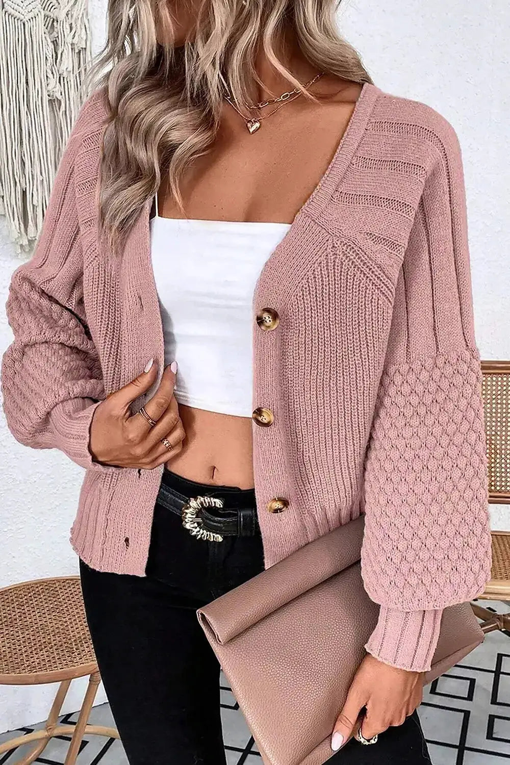 V-Neck Button-Down Cardigan in pink knit with oversized textured sleeves and gold buttons