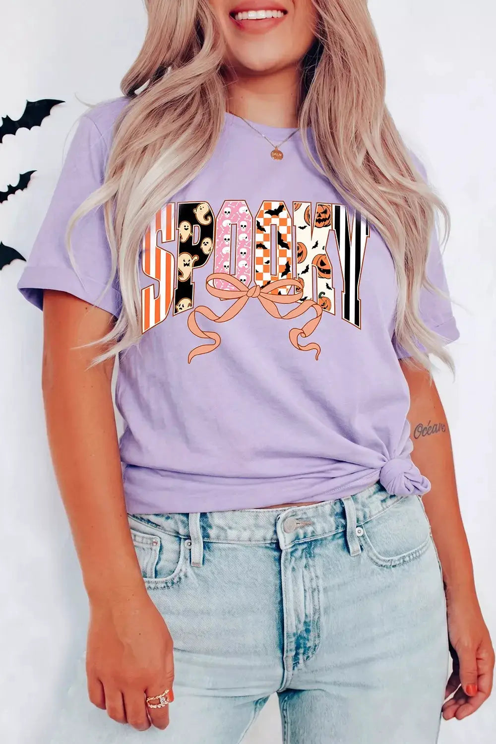 Halloween Spooky Letter Graphic T-shirt in lavender with leopard/pumpkin letters and pink bow detail