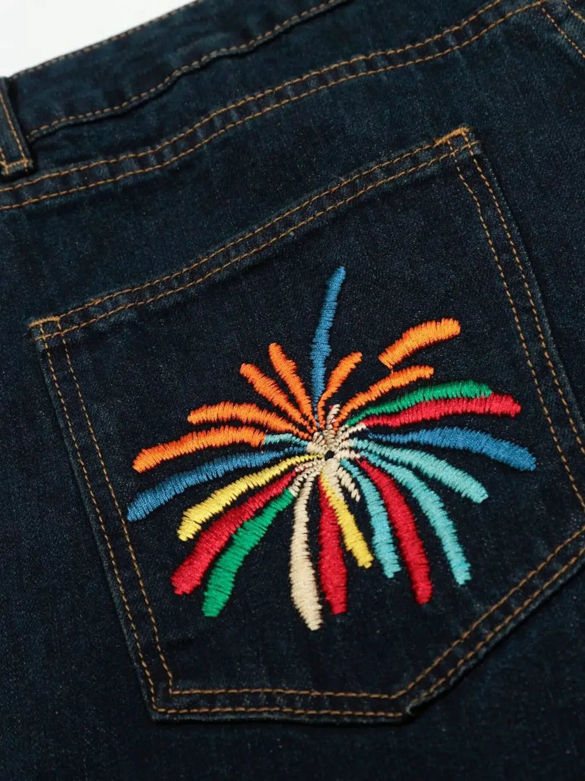 Oversized men's wide-leg denim shorts, 100% cotton, dark indigo with colorful embroidery on back pocket