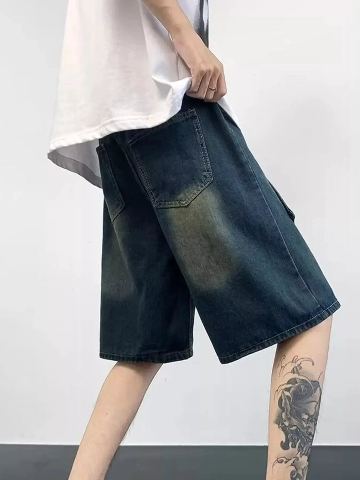 Mens plus-size washed denim shorts with soft cotton-stretch pockets in dark indigo
