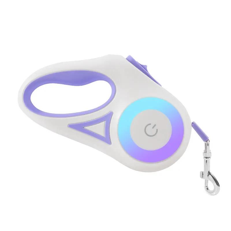 AdTec retractable dog leash with LED ring, white body and purple accents, includes metal clip.