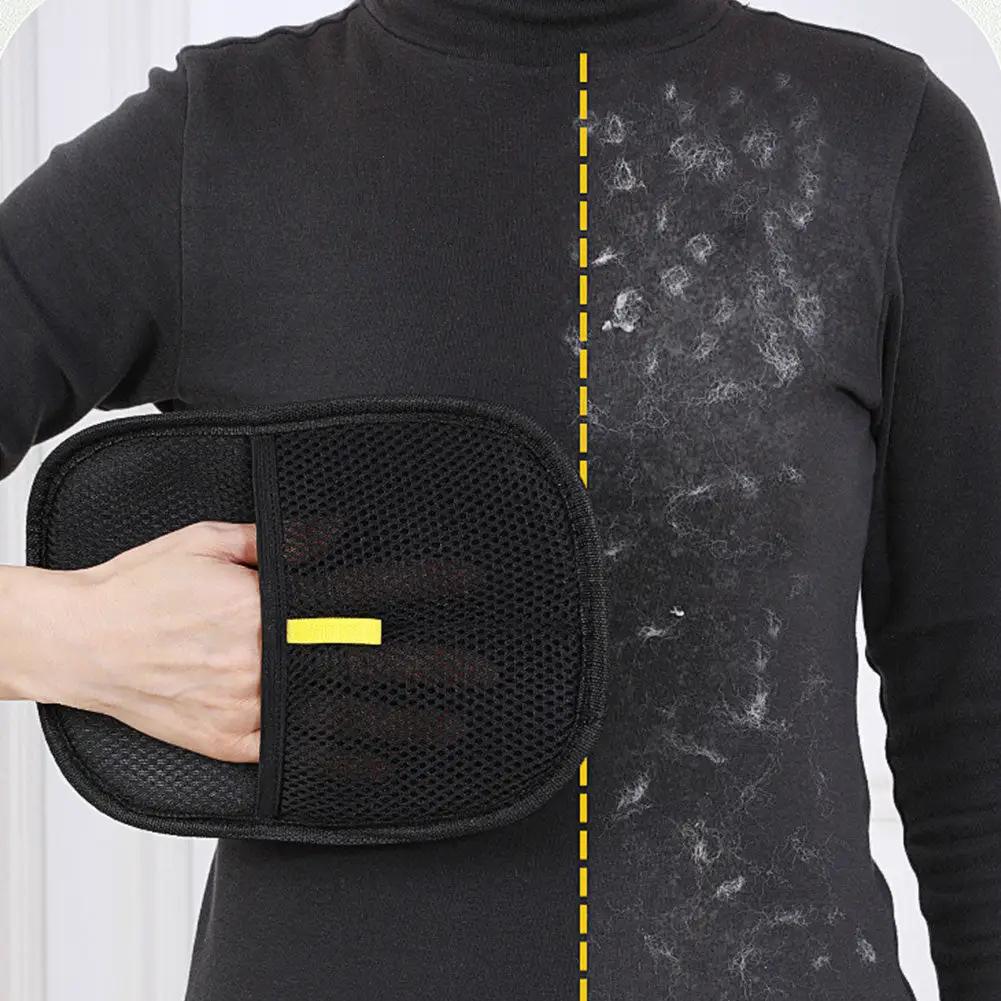 Pet hair remover glove in black mesh with a yellow tab; deshedding mitt for dogs, cats, and rabbits.
