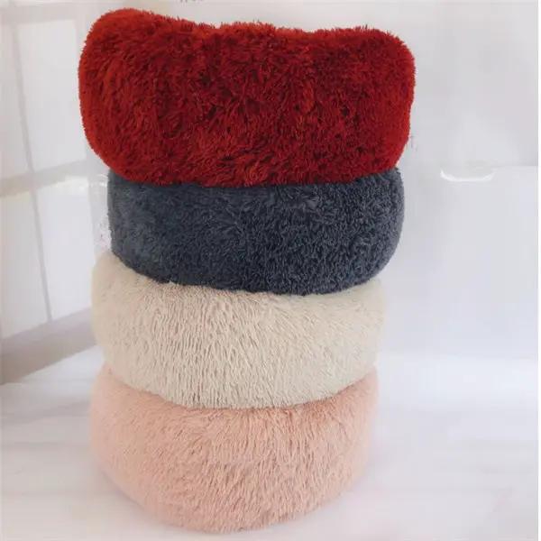 Round long-hairy cat nest pad mattress set of four by AdTec in red, navy, cream, peach