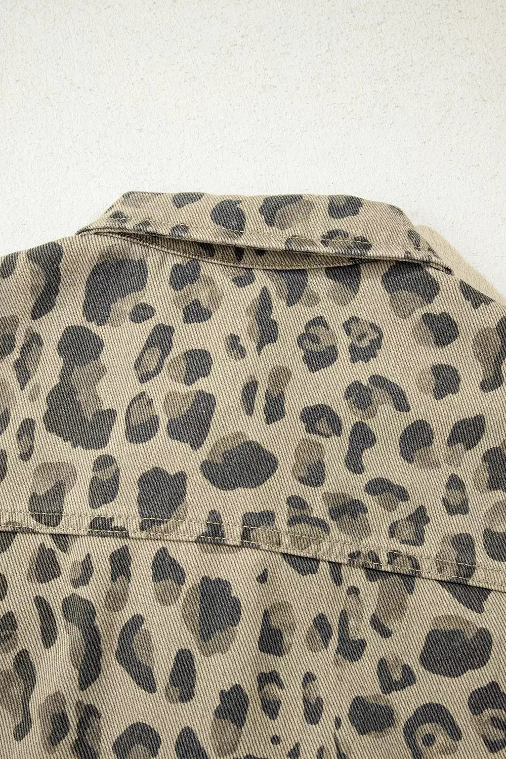 Leopard-print denim jacket, tan base with dark spots, cotton-blend, button-down, tailored fit