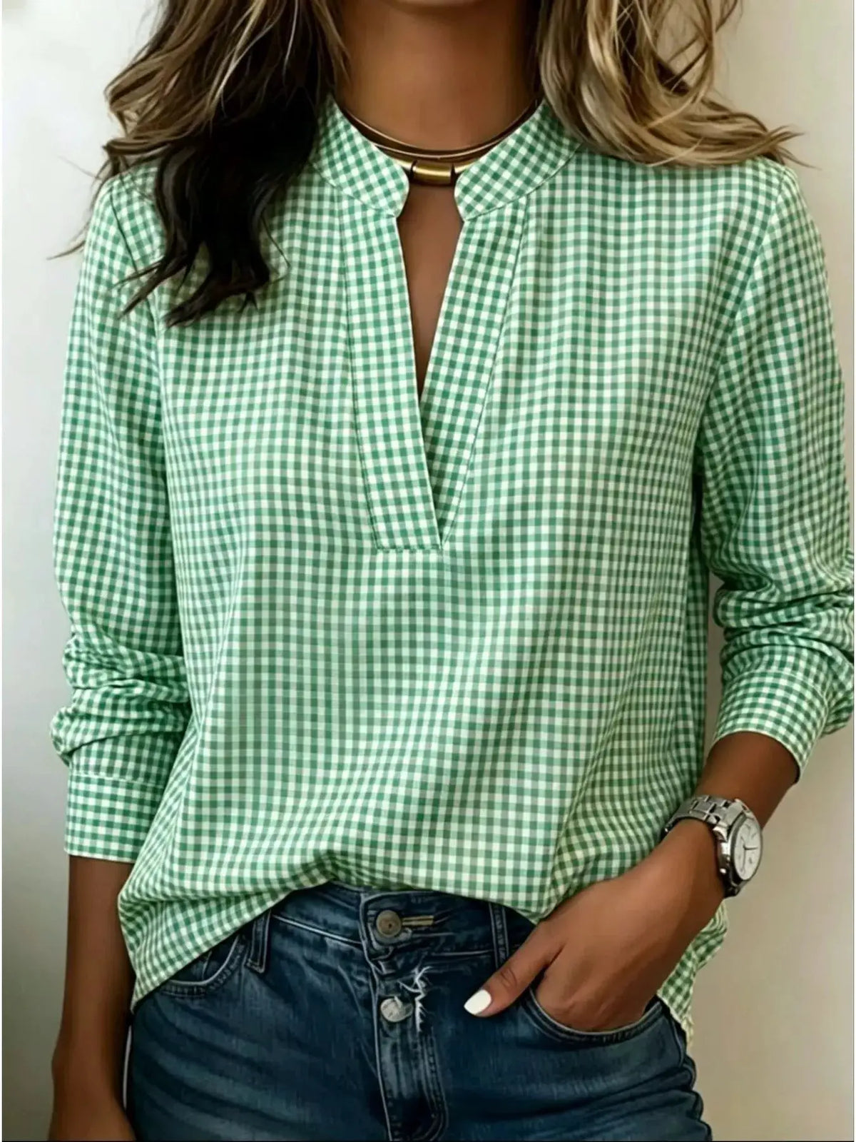 Plus-size plaid notched long-sleeve blouse in green and white gingham.