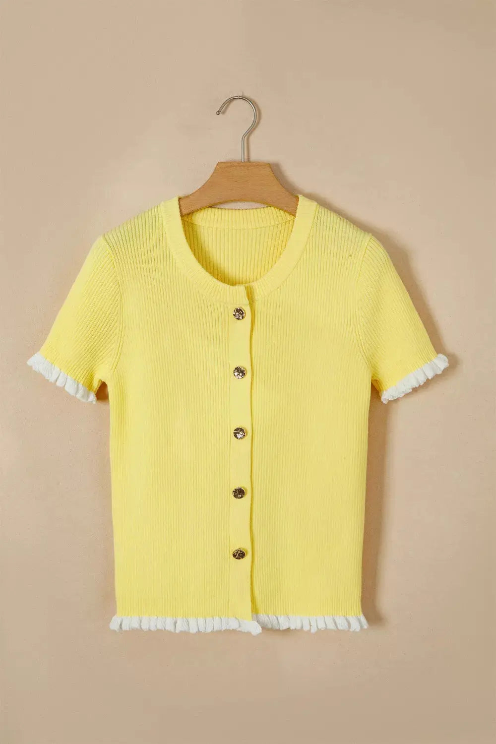 Short-sleeve ribbed knit cardigan in yellow with white frill edges and gold front buttons