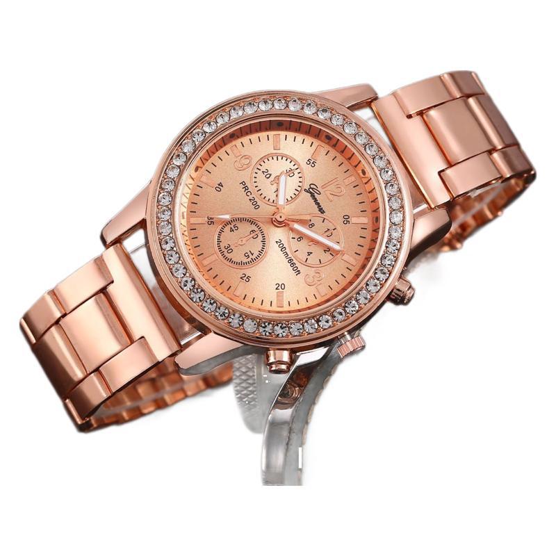 Montre à quartz dorée Genève à bracelet en acier