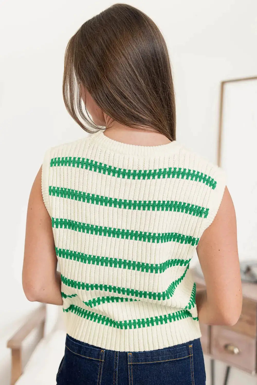 Striped white knit round-neck sweater vest with green horizontal stripes