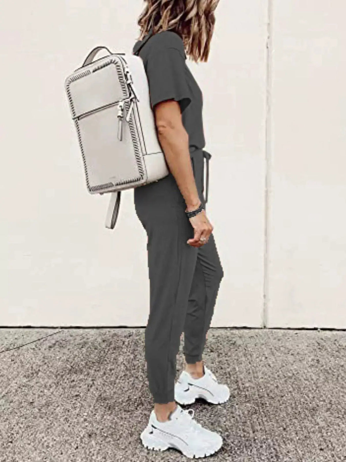 Full Size Round Neck Top and Drawstring Pants Set Plus Size in gray worn by a model