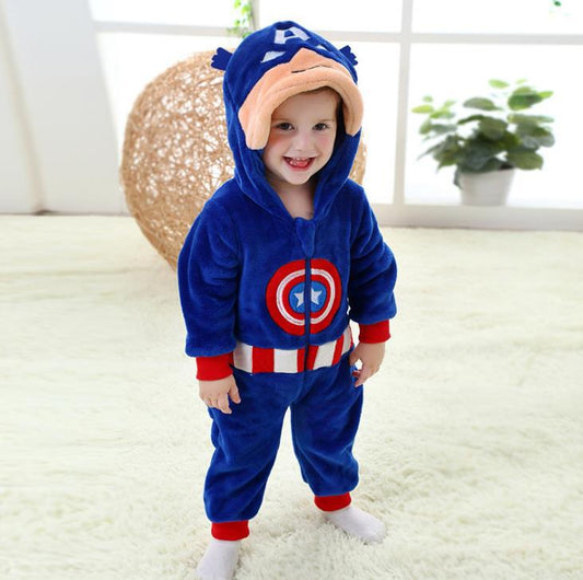 Baby jumpsuit costume in blue with red cuffs and striped waistband, child in a hooded superhero outfit.