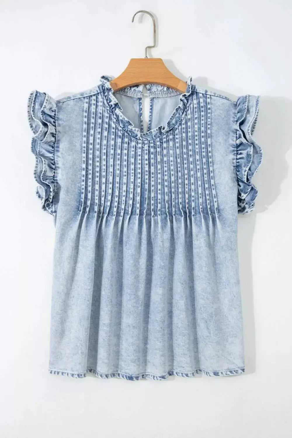 Vintage washed denim top with delicate ruffle sleeves and pleated front.
