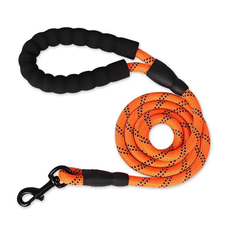AdTec reflective nylon dog leash, bright orange rope with black padded handle and clip.