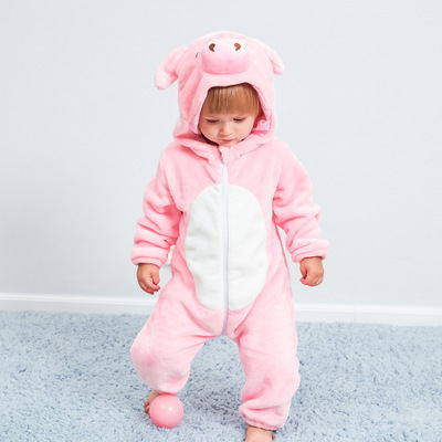 Baby animal jumpsuit by AdTec; pink plush one-piece with white belly and hood with ears.