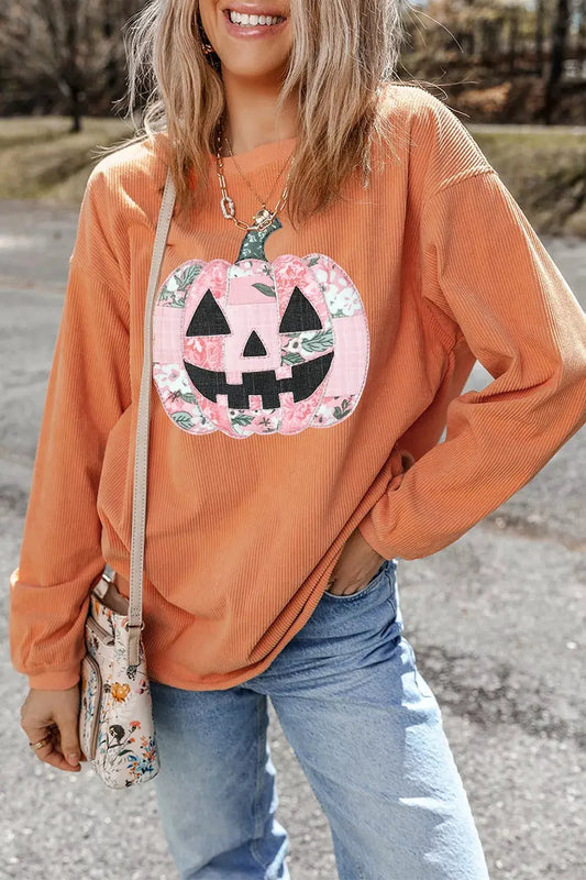 Patchwork pumpkin graphic corded ribbed round-neck tunic sweatshirt in peach with pink floral panels