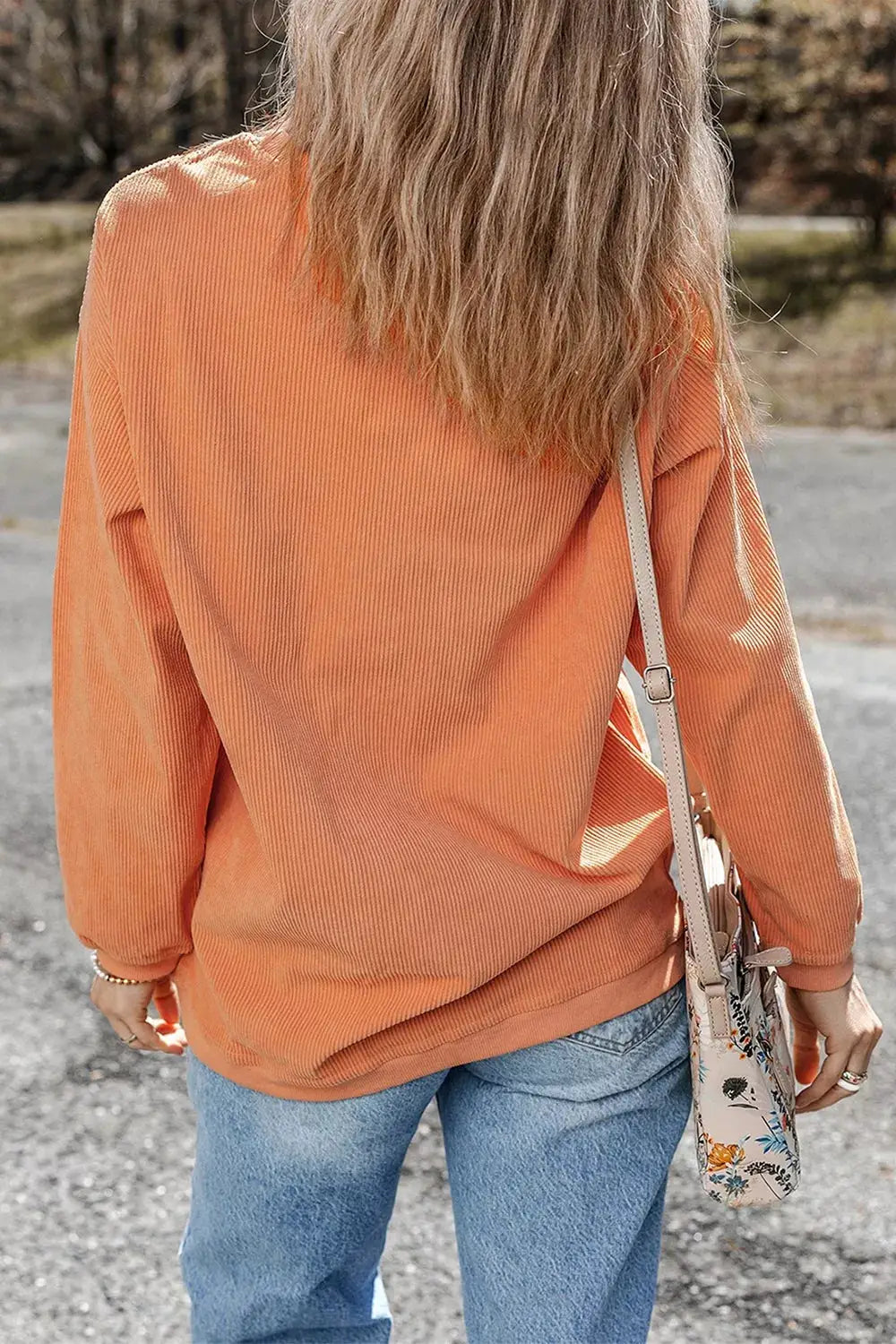 Corded ribbed orange tunic sweatshirt with round neck and long sleeves