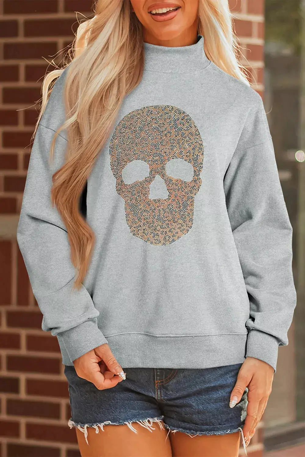 Sweatshirt gray baggy pullover with Halloween rhinestone skull graphic on front, mock neck