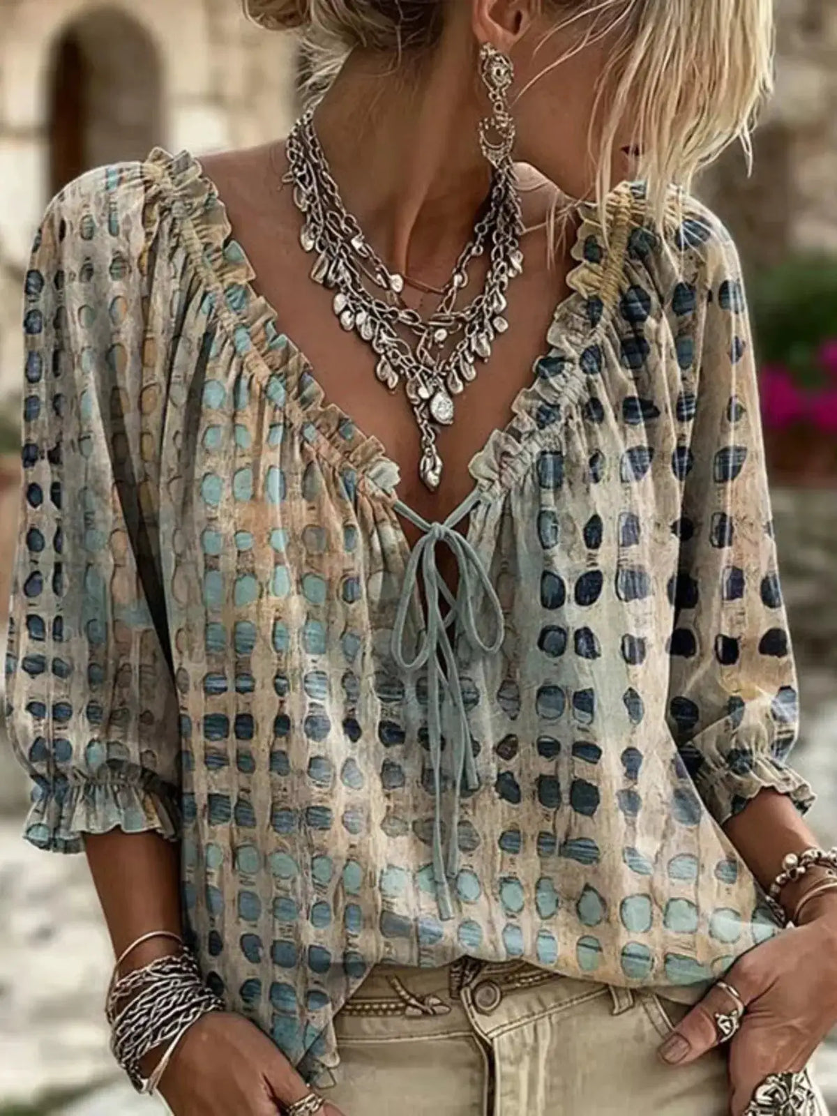 Plus-size tie-neck blouse with 3/4 sleeves in beige-blue printed fabric