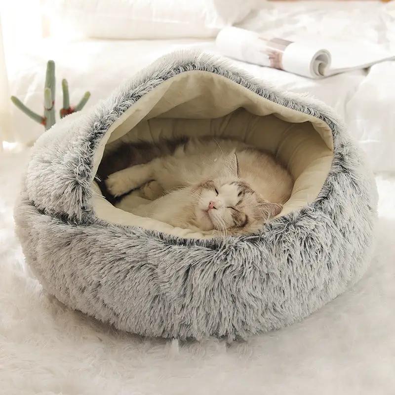 Plush shell pet nest in grey faux fur with beige lining, cozy cat inside