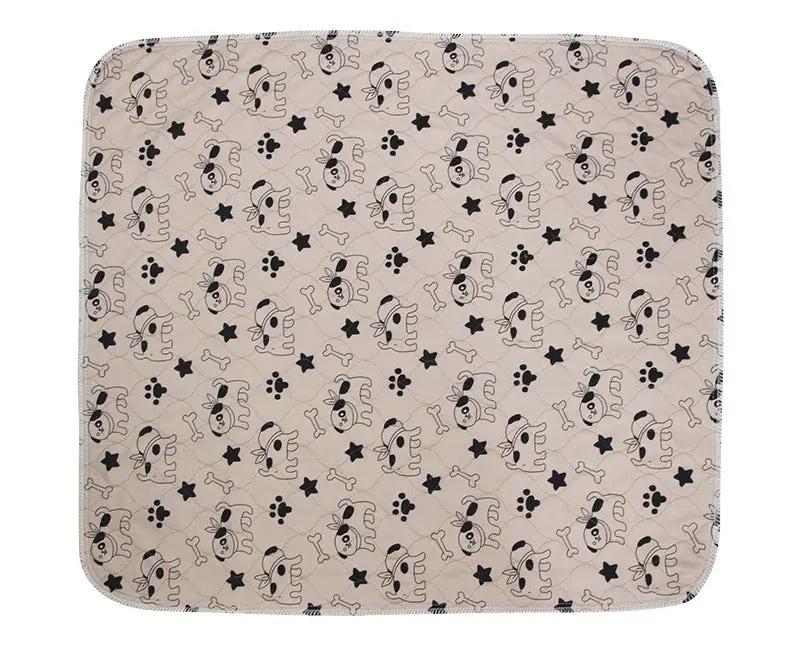 Three-layer Waterproof Pet Absorbent Pad by AdTec in beige with repeating dog faces, bones, paws, and stars.