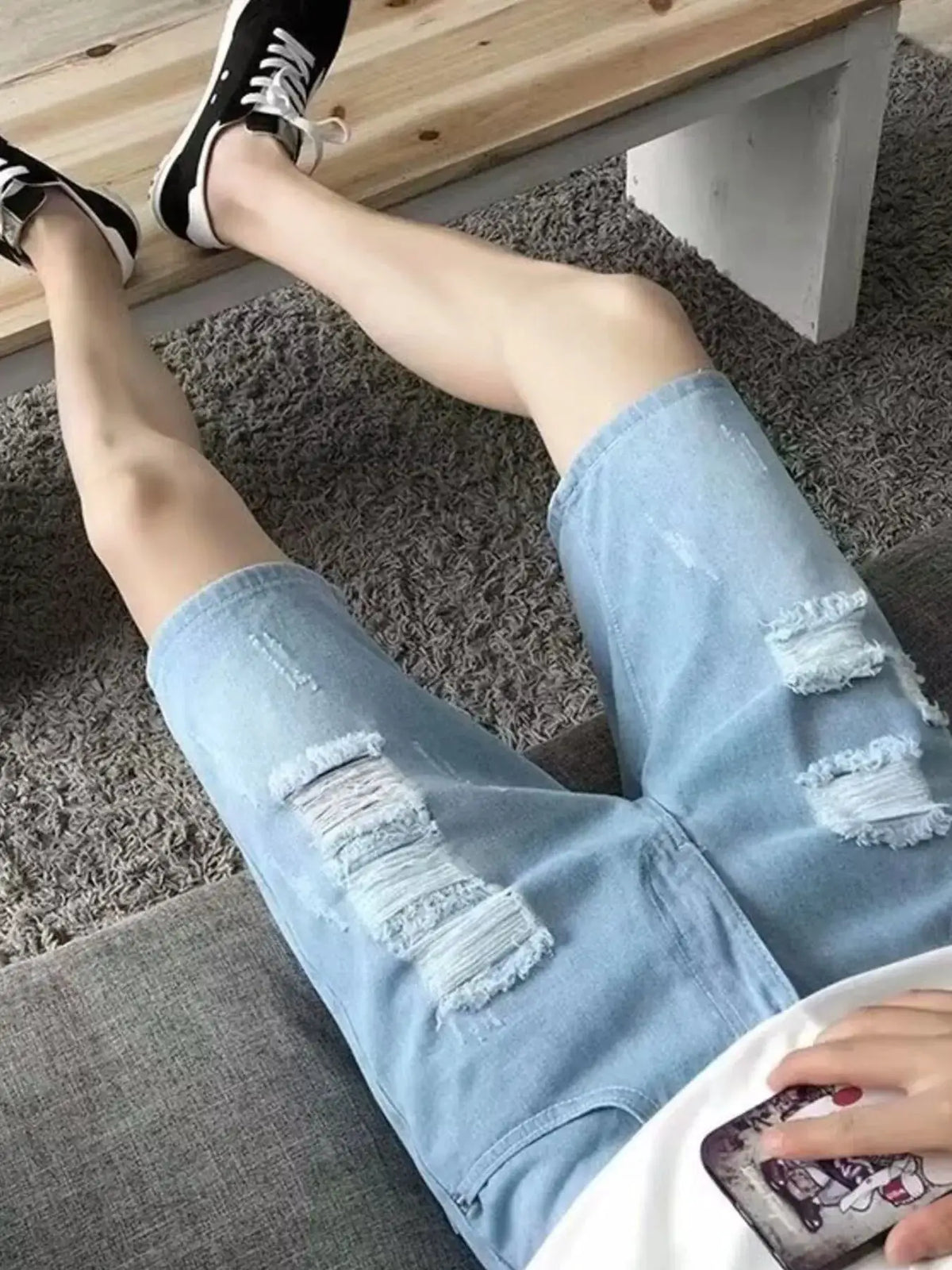 Mens relaxed-fit distressed wash vintage denim shorts in light blue
